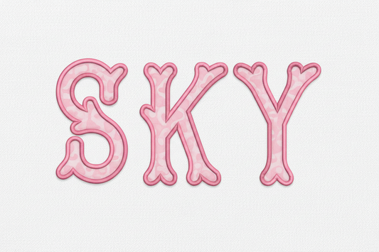 SKY heart applique embroidery font on white fabric